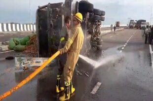 Lucknow: Truck catches fire after overturning on Kisan Path