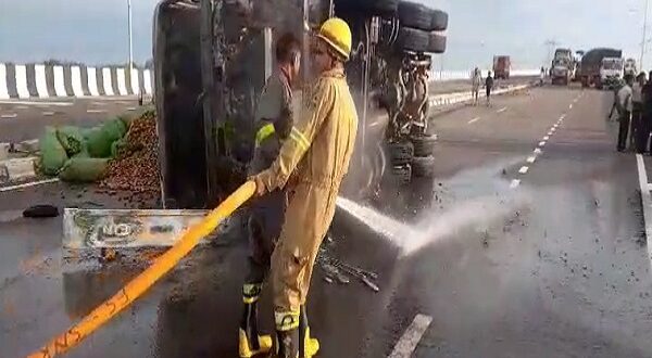 Lucknow: Truck catches fire after overturning on Kisan Path