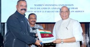 Defence Minister receives flag of Open Water Swimming Campaign