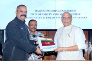 Defence Minister receives flag of Open Water Swimming Campaign