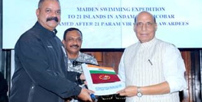 Defence Minister receives flag of Open Water Swimming Campaign