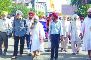 Sikh community took out a protest march on the occasion of eight years long dharna for Gurdwara Gyan Goddi.